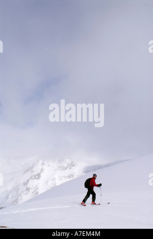 Skier Skinning up the Asulkan Glacier, Rogers Pass area, Selkirk Mountains, Canadian Rockies, British Columbia, Canada Stock Photo