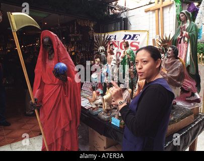 Mexico, North America. Angelia Monroy offers images of the Saint of Death in the Sonora Market, in Mexico City. Stock Photo