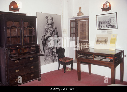 Display with writing desk, room of the National  Palace Museum, former Sultan`s Palace, Stone Town, Zanzibar Stock Photo