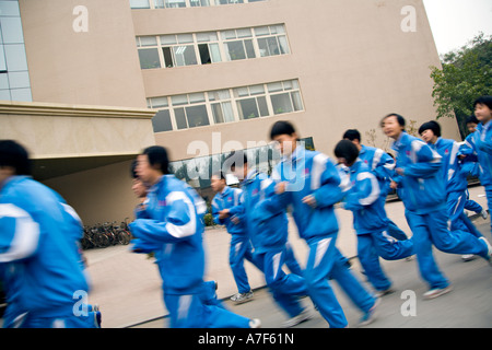 CHINA BEIJING High school physical education class students running ...