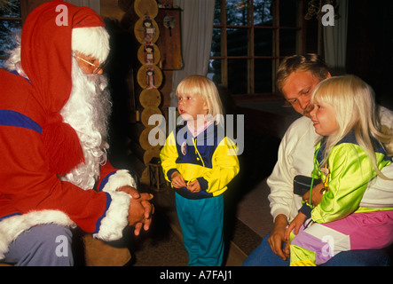 children, visiting, Santa Claus, Santa Claus Village and Santapark, Santa Claus Village, Christmas, Santapark, Rovaniemi, Arctic Circle, Finland Stock Photo