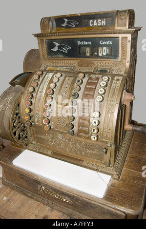 Old antique brass metal cash register Stock Photo