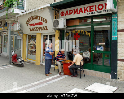 Greece Thessaly little town Elassona men playing Tavli Backgammon on the street Stock Photo