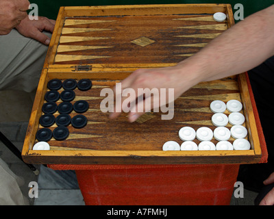 Greece men playing Tavli Backgammon on the street Stock Photo