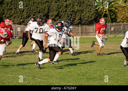 Junior varsity high school American football game. Stock Photo