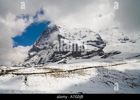 Railroad track runs up side of hill before disappearing into tunnels inside mountain on it s way from Kleine Scheidigg above Int Stock Photo