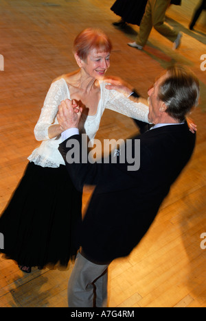 https://l450v.alamy.com/450v/a7g4rm/elderly-couples-having-fun-at-a-tea-dance-hammersmith-town-hall-london-a7g4rm.jpg