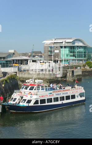 A sightseeing launch at the Mayflower Steps outside the National Marine Aquarium Plymouth Devon Great Britain Stock Photo