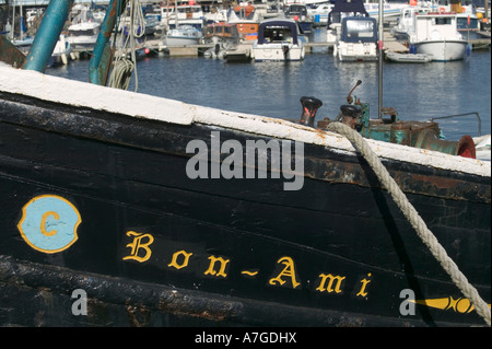 A boat s name on the bow Sutton Harbour Plymouth Devon Great Britain Stock Photo