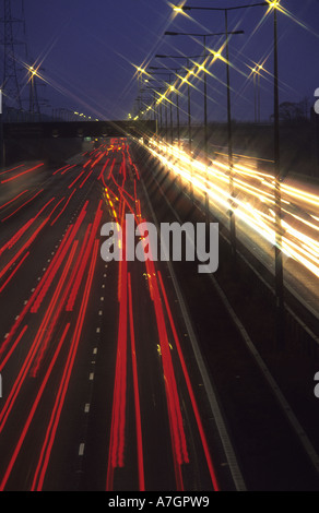 long time exposure of traffic travelling on the m62 motorway at night leeds uk Stock Photo