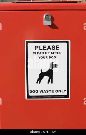Red clean up after your dog bin Cotswolds UK Stock Photo