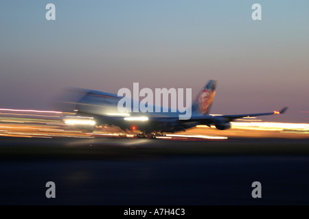 Night take off of British Airways Boeing 747 at London Heathrow Airport UK 2004 Stock Photo