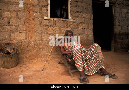 Village elder in front of his homestead, Tafi Atome, Volta Region, Ghana Stock Photo