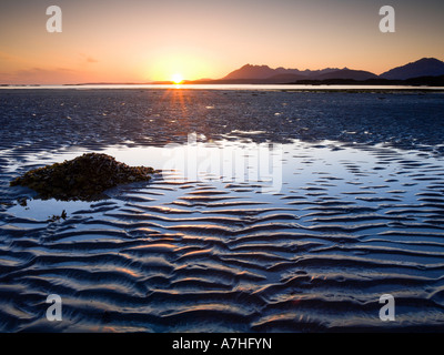 Tarskavaig Bay at sunset looking across Loch Eishort to the Black Cuillin Ridge Sleat Skye Scotland Stock Photo