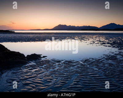 Tarskavaig Bay at sunset looking across Loch Eishort to the Black Cuillin Ridge Sleat Skye Scotland Stock Photo