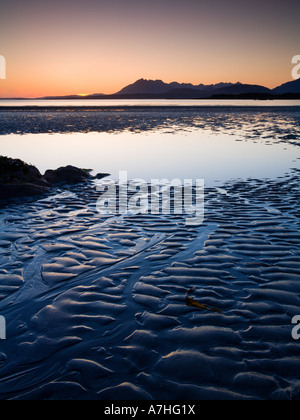 Tarskavaig Bay at sunset looking across Loch Eishort to the Black Cuillin Ridge Sleat Skye Scotland Stock Photo