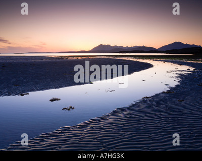 Tarskavaig Bay at sunset looking across Loch Eishort to the Black Cuillin Ridge Sleat Skye Scotland Stock Photo