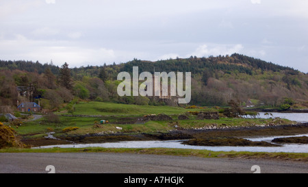 Dunvegan Castle on the Shores of Loch Dunvegan occupied by Macleod s Skye Scotland UK Stock Photo