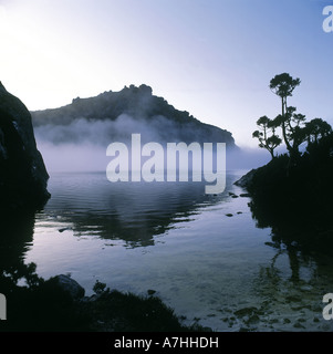 Lake Oberon with morning mist. Western Arthur Range, Southwest National Park, Tasmania, Australia Stock Photo