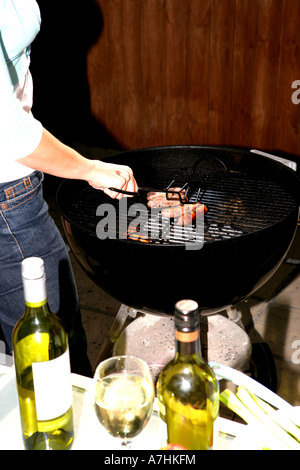 Young Women Having a Barbeque Models Released Stock Photo