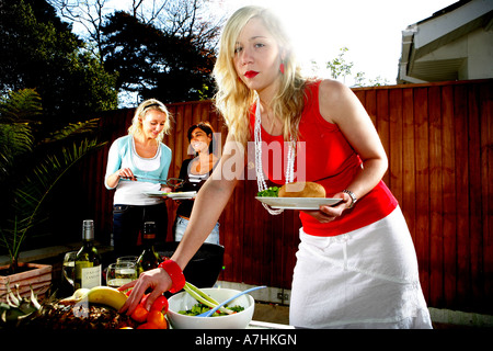 Young Women Having a Barbeque Models Released Stock Photo