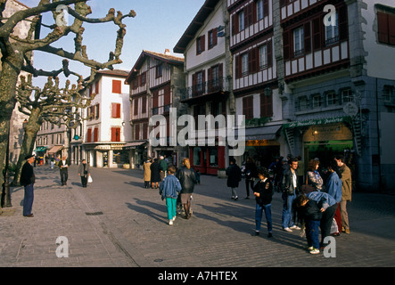 French people, tourists, walking, strolling, pedestrian zone, rue pieton, Rue Gambetta, town of Saint-Jean-de-Luz, Saint Jean de Luz, France, France Stock Photo