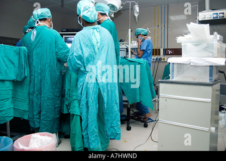 Surgeons inside an emergency room in India doing their thing Stock Photo