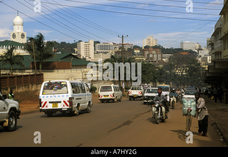 Kampala streetscene matatus minibusses that serve as public transport are the main transport on the streets Uganda Stock Photo