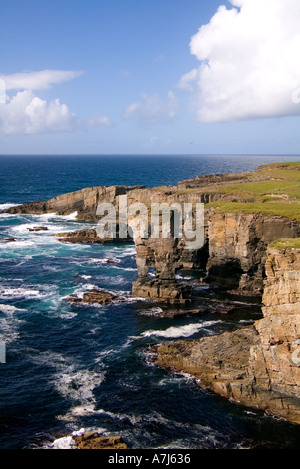 dh Yesnaby Castle YESNABY ORKNEY Sea stack waves breaking rocky seacliffs coast Stock Photo