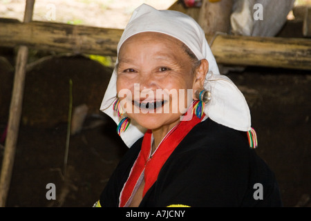 Smiling Akha woman from chewing betel nut with black teeth Stock Photo