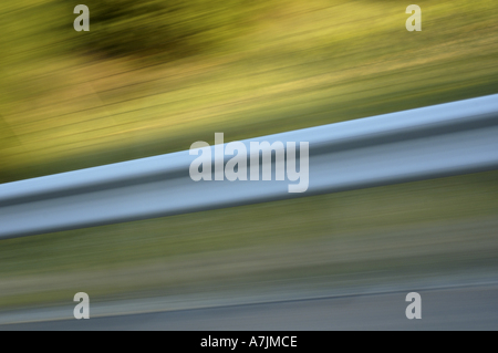 Side view from a speeding car on a highway Stock Photo