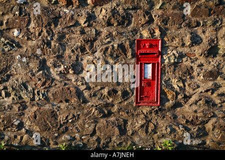 Victorian post box in a rough stone wall Wales UK Stock Photo