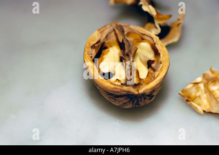 Cracked open walnut Stock Photo