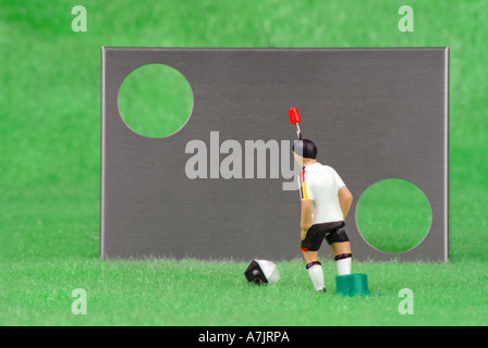 soccer game ball goal shooting wall player Torwand mit Ball und Spieler Stock Photo