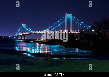 'Whitestone Bridge' twinkling lit up at night against a dark blue sky Stock Photo