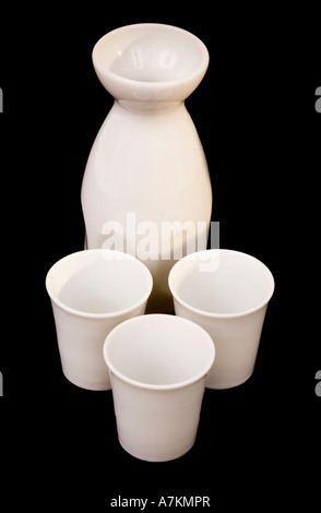 Sake serving set isolated on black Stock Photo