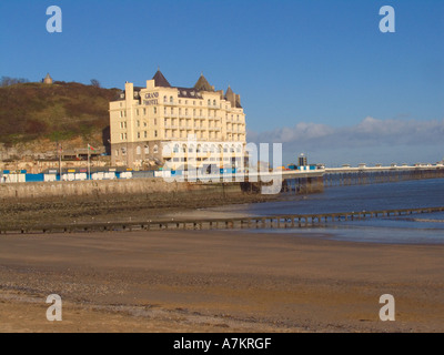 LLANDUDNO CONWY NORTH WALES UK January Looking across the North Shore the principal beach towards Grand Hotel and Pier popular Welsh seaside resort Stock Photo