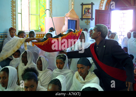 Ethiopia - offerings in an umbrella during palm sunday mass in the catholic Cathedral of the Holy Saviour - Adigrat Ethiopia Stock Photo