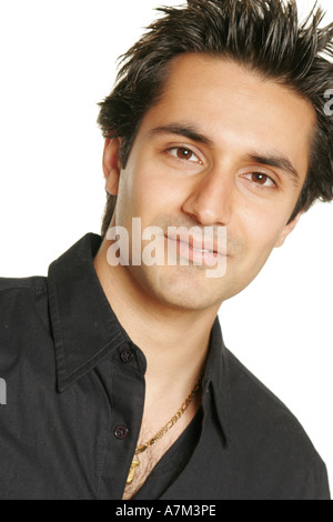 Young asian indian male man looking happy, successful and healthy Stock Photo
