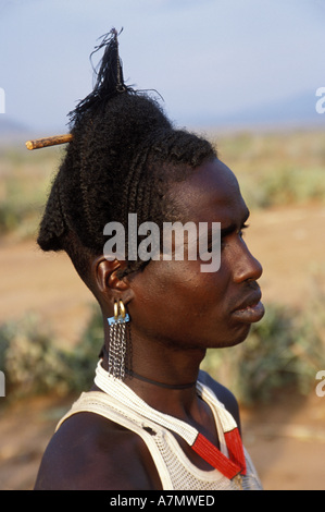 Hamar tribe man with fancy hair do complete with clay and fluffy bird  feather in the Omo region of Ethiopia Stock Photo - Alamy