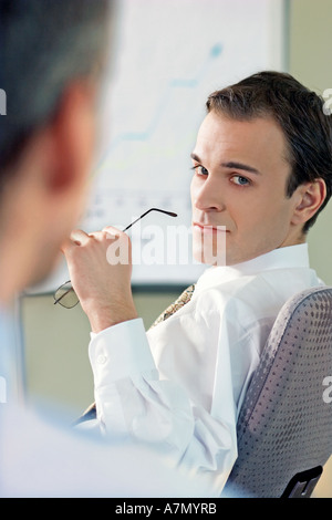 Two men sitting in the office. Stock Photo