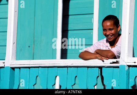 Dominican Republic, Samana province, Sanchez, girl at her balcony Stock Photo