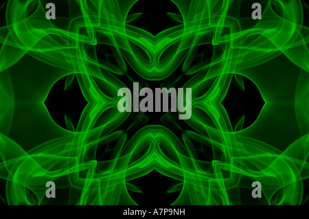 kaleidoscope kaleidoscopic pattern shapes green black abstract art arty horizontal design smokey beautiful subtle sublime concep Stock Photo