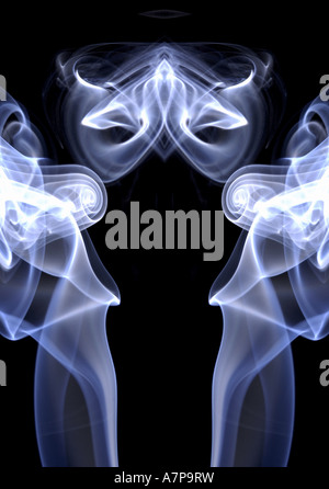 kaleidoscope kaleidoscopic pattern shapes  blue black abstract art arty horizontal design smokey beautiful subtle sublime concep Stock Photo