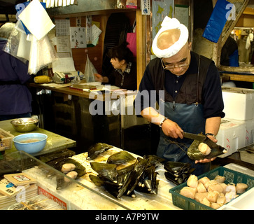 Tokyo Japan Tsukiji  fish market is the biggest wholesale fish and seafood market in the world. Tuna Auction, Japanese Stock Photo