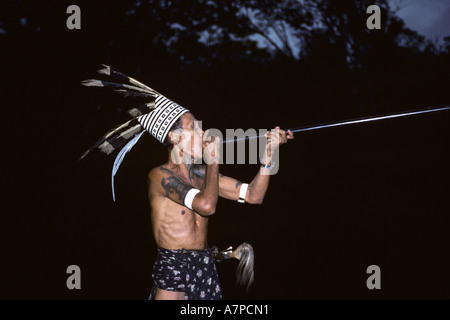 man with blowtube at the longhouse Bunu of the Dayak Iban, Malaysia, Sarawak Stock Photo