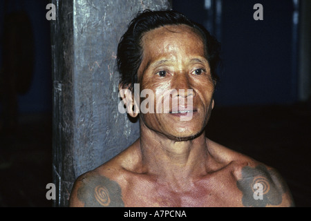 man with tatoo at the longhouse Bunu of the Dayak Iban, Malaysia, Sarawak Stock Photo