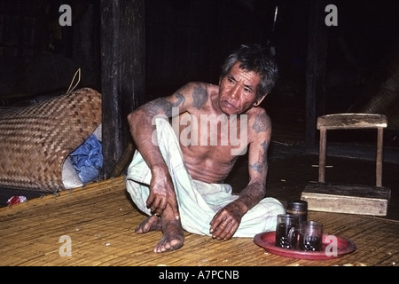 man with tattoo at the longhouse Bunu of the Dayak Iban, Malaysia, Sarawak Stock Photo