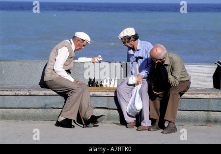 Ukraine, Crimea region, harbour of Yalta, chess player by the sea Stock Photo