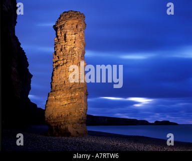 Limestone sea stack at Marsden Bay on the South Tyneside coastline in the North East of England. Known locally as Lots Wife. Stock Photo
